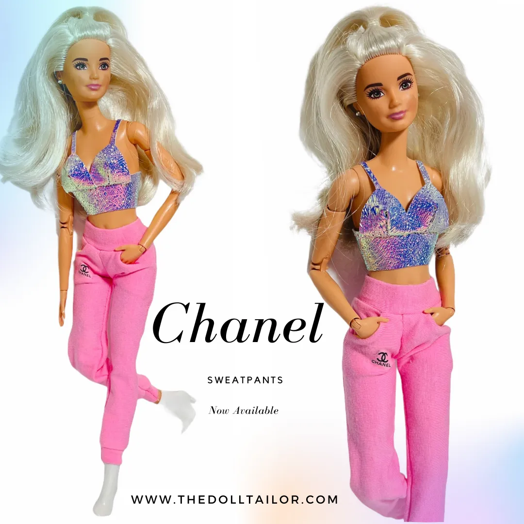 Pink sweatpants for Barbie dolls with pockets